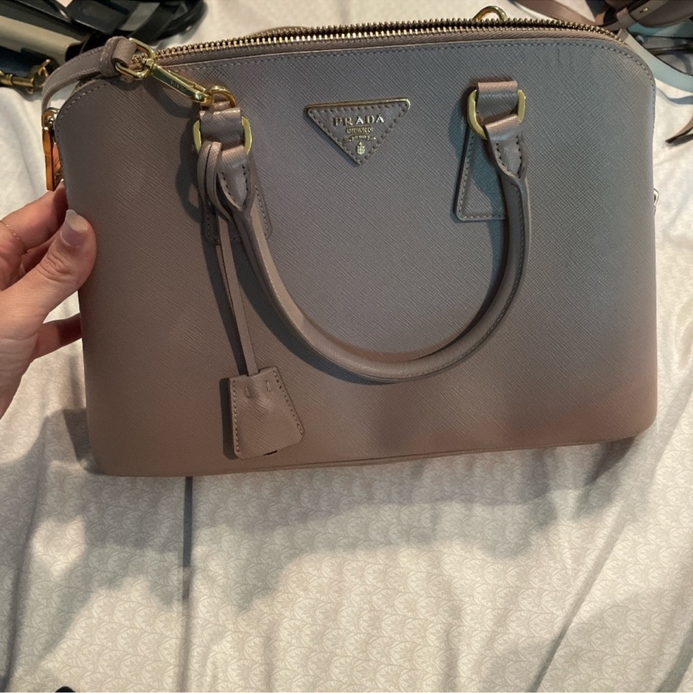 Authentic PRADA top handle dome handbag/crossbody in NUDE PINK color
